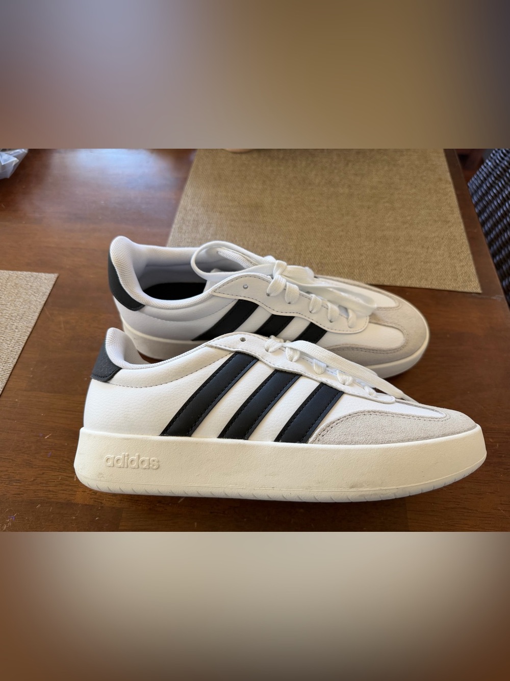 Adidas‎ Barreda sneakers featuring a classic white/black colorway with a suede